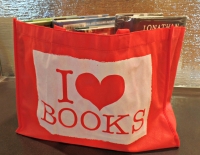 Red bag with a design saying "I (heart symbol) books"